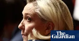 Marine Le Pen should stand trial over alleged misuse of EU funds, say prosecutors