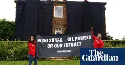 Greenpeace protesters drape giant oil-black fabric over Sunak’s mansion