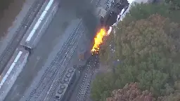 Train carrying 4K gallons of diesel fuel derails, catches fire after colliding with another train