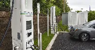 Electrify America is the next big charging network to adopt Tesla’s ‘standard’ EV plug · The Verge