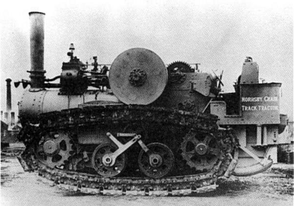 black and white photo of a steam powered track-drive vehicle