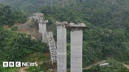 At least 17 dead in India railway bridge collapse