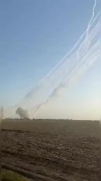 Two HIMARS launchers sending a full salvo to Russian positions