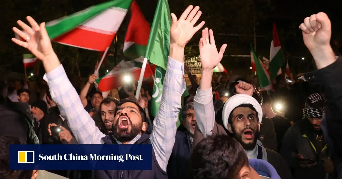 ‘God’s victory is near’: Iranians celebrate in streets following attack on Israel