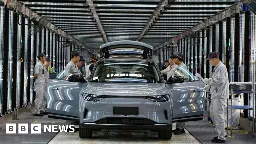 Biden quadruples tariffs on Chinese electric cars - BBC News