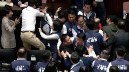 See chaotic brawl in Taiwan Parliament over chamber reforms | CNN
