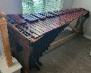 A Marimba I built last year - took me a bit over half a year to complete. 61 keys made of Padauk, all hand-tuned, on a frame of Red Oak and Walnut
