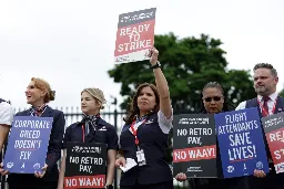 American Airlines Flight Attendants Just Won Boarding Pay