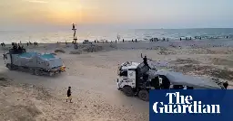 Supplies arrive in Gaza via new pier but land routes essential, says US aid chief