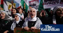 ‘No ceasefire, no votes’: tens of thousands attend pro-Palestinian rally in Washington DC