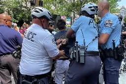 5 Moms for Liberty protesters were arrested for blocking traffic outside Marriott, activists say