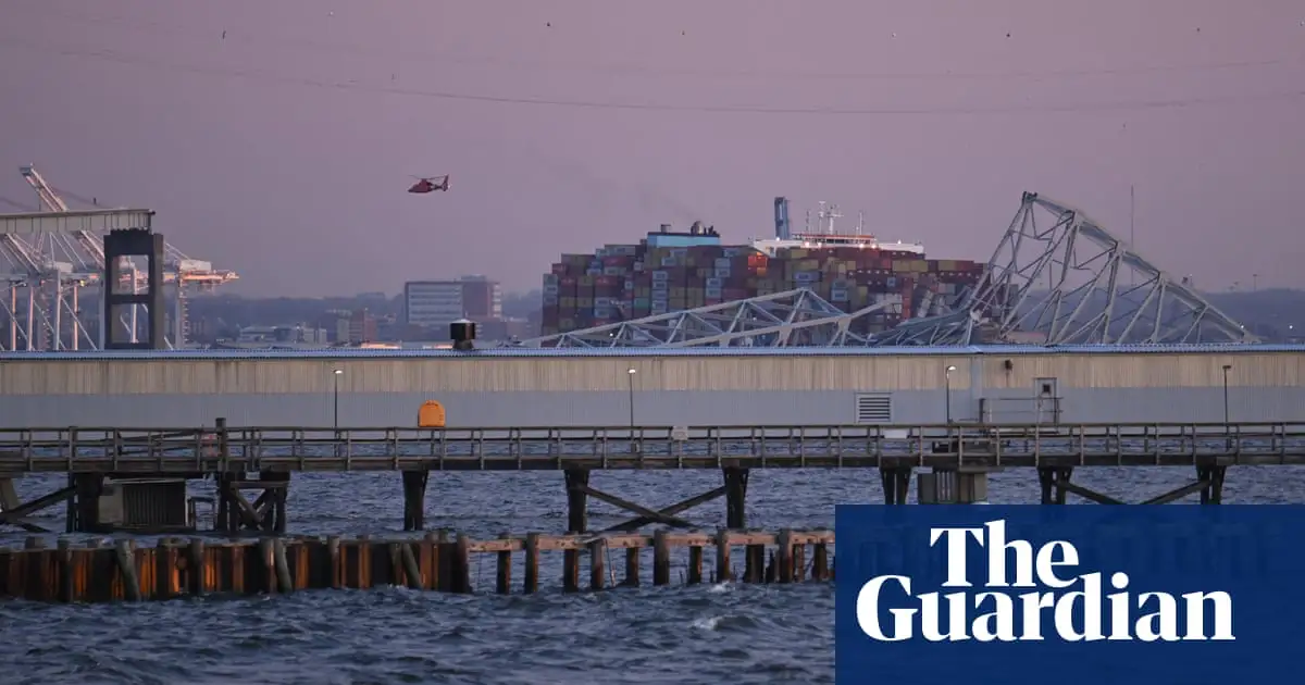 Baltimore Key Bridge collapse: vehicles fall into water after ship hits bridge