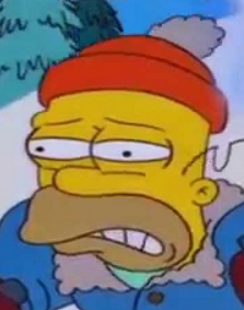 close crop of homer simpson's face grimacing (at the thought of stupid sexy flanders), no text