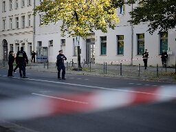 The German chancellor condemns a firebomb attack on a Berlin synagogue and vows protection for Jews